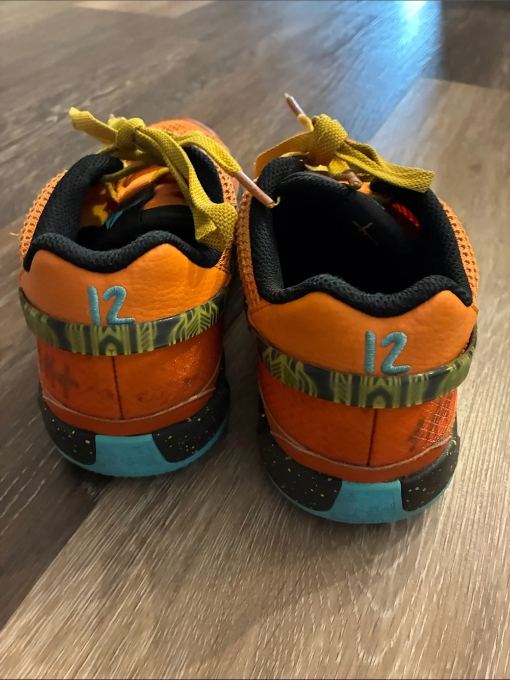 Nike Kids Orange and Yellow Mesh Athletic Sneakers with Teal Sole